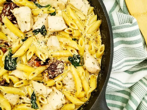 This Tuscan chicken pasta is creamy, cheesy, and decadent. In as little as 30 minutes you can have restaurant-quality pasta on the table for the perfect weeknight dinner.