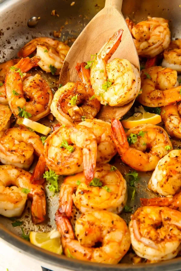 Cajun shrimp is juicy, super flavorful, and ready in 15 minutes- the perfect quick and easy meal the whole family will love!